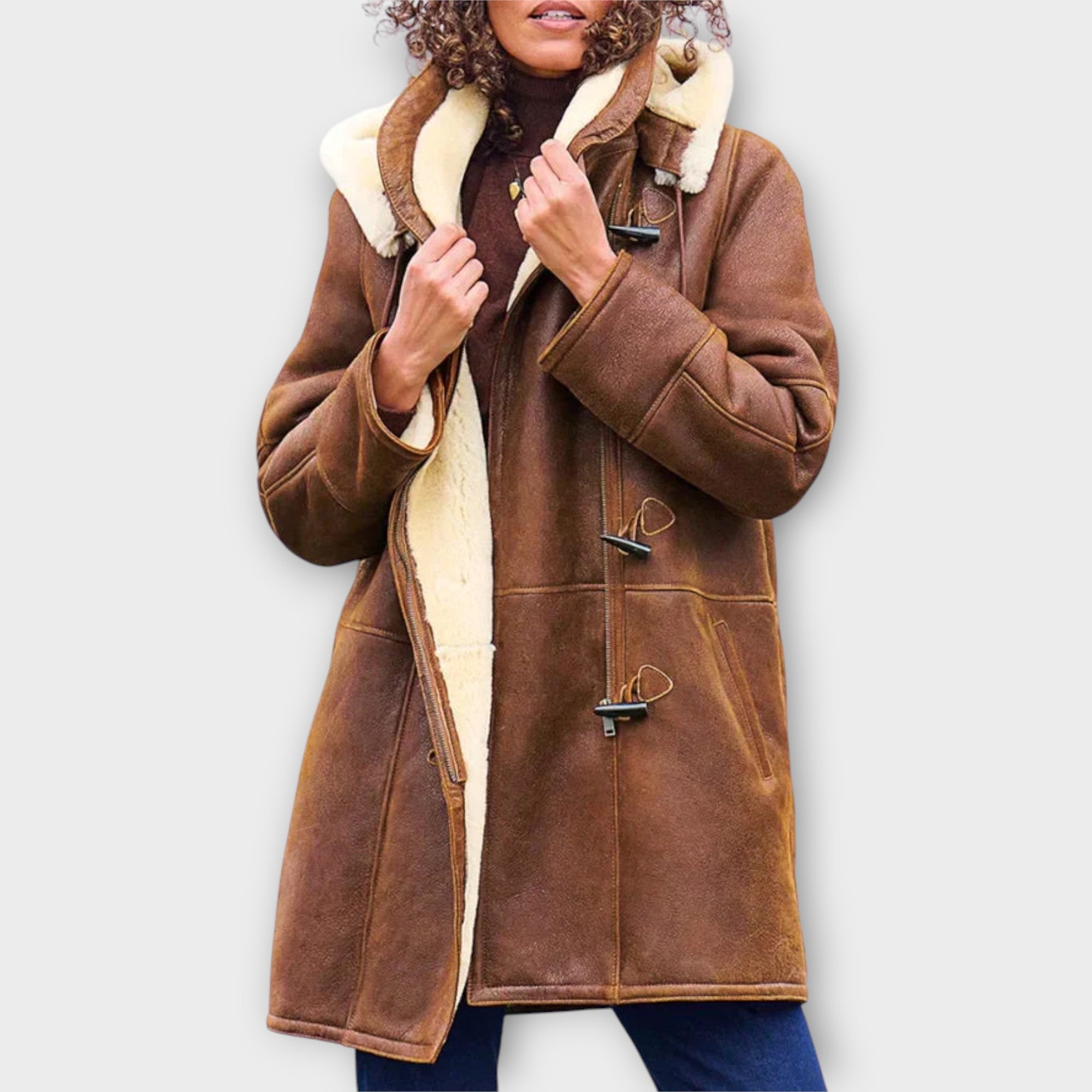 Women's Hooded Longline Coat with Zip Closure and Side Pockets
